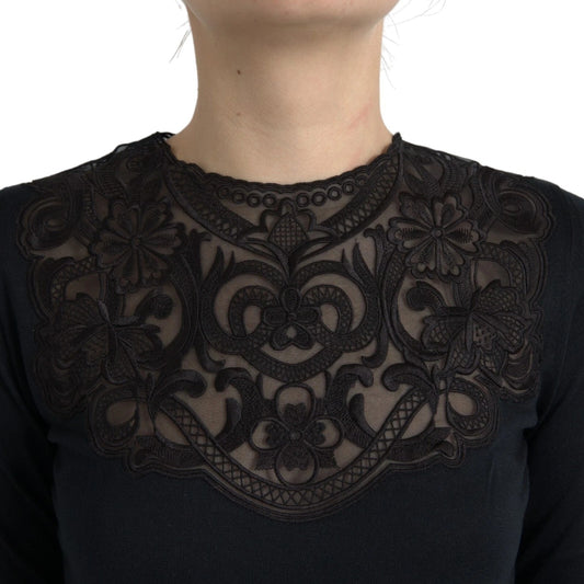 Black lace top with intricate design on neckline