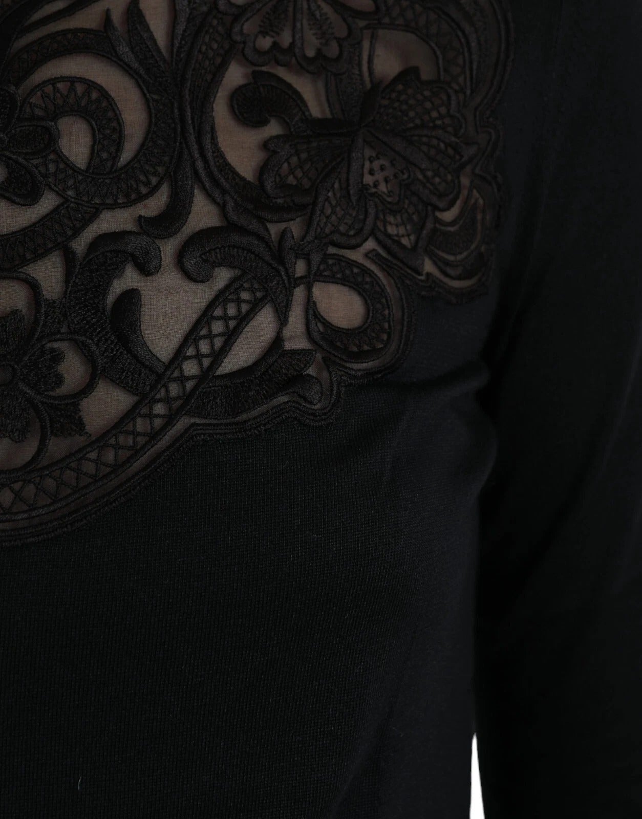 Black lace top with intricate design on back