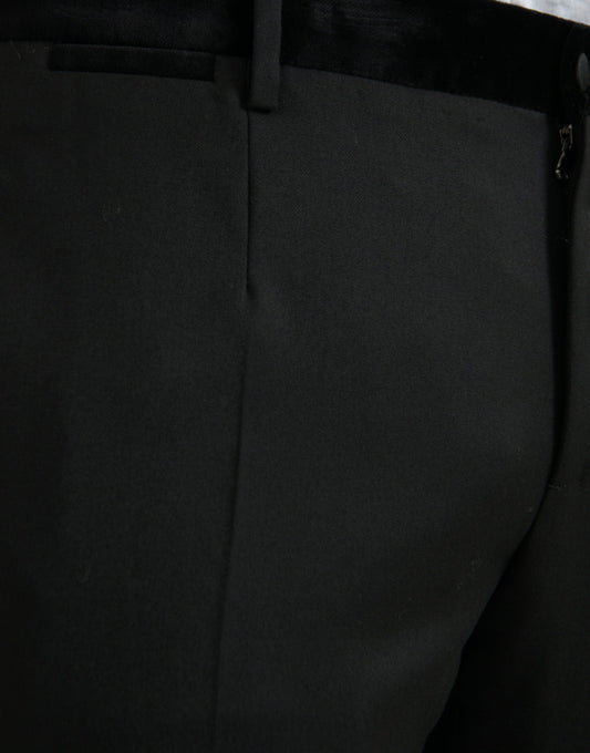 A pair of black silk men's skinny dress pants from the brand Dolce & Gabbana