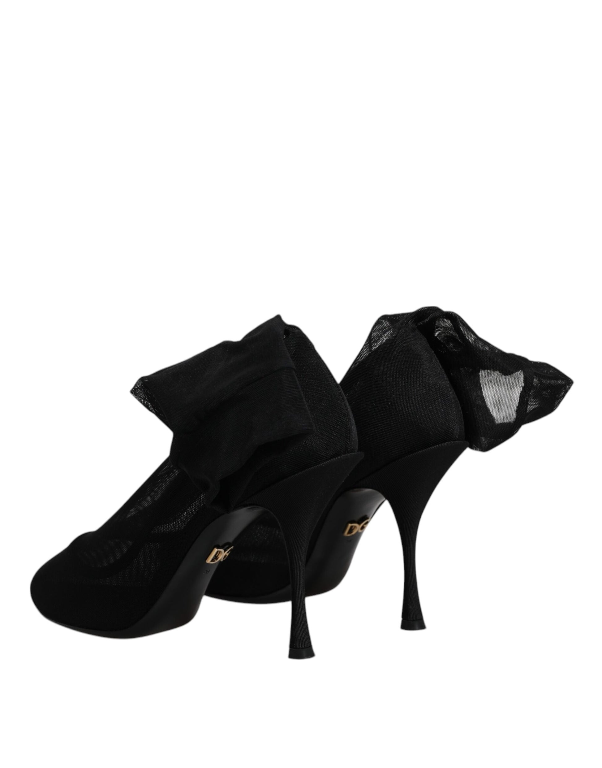 Pair of black high heel shoes with ankle straps