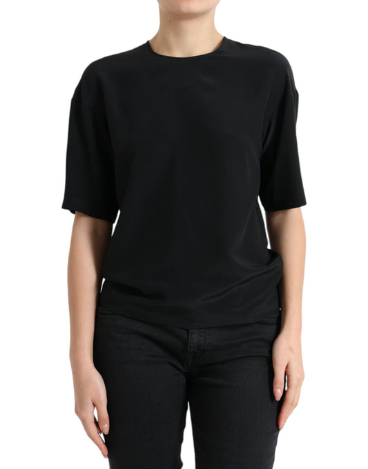 Black short sleeve shirt on a mannequin