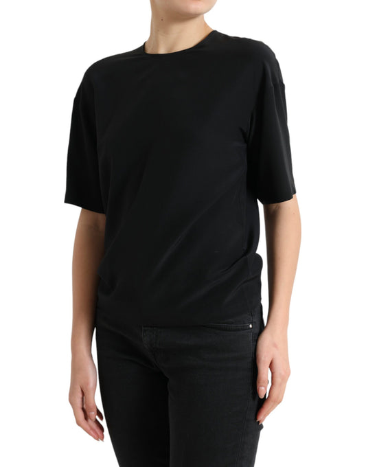 Black short sleeve shirt on a person
