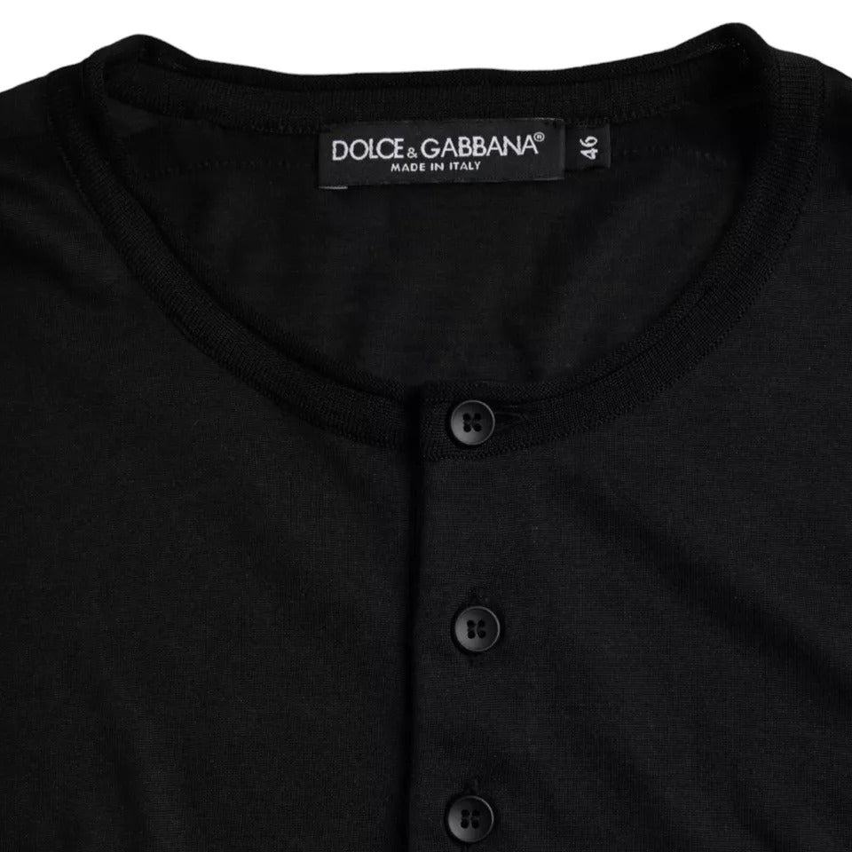 Black long sleeve shirt with buttons on front