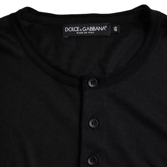 Black long sleeve shirt with buttons on front