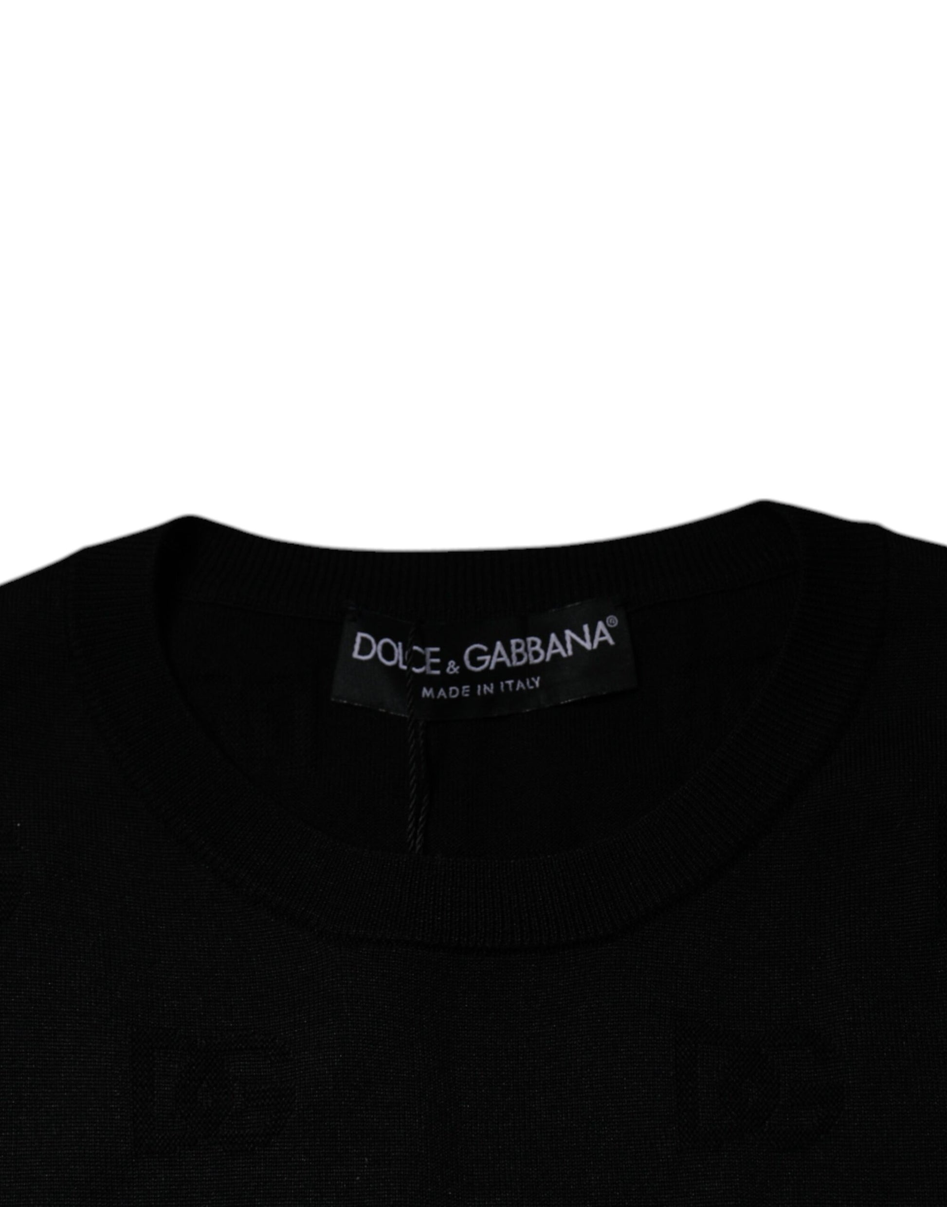 Black sweater with brand label on neck