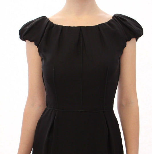Black sleeveless dress with ruffled shoulders