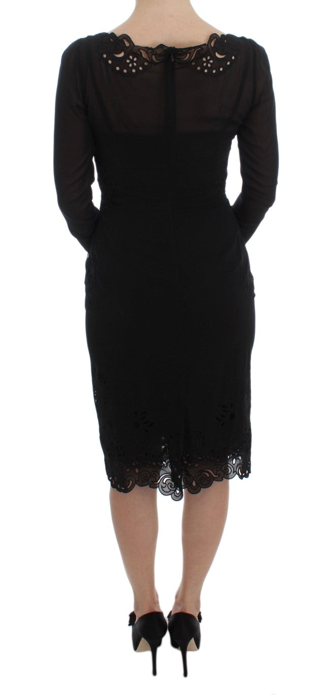 A black silk stretch sheath dress with lace detailing
