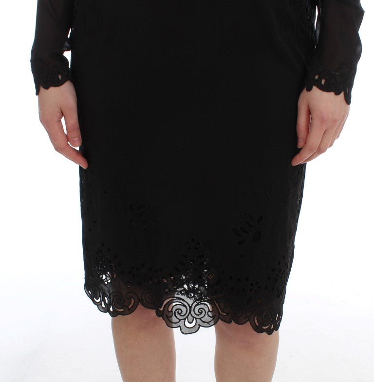 A black silk stretch sheath dress with lace detailing
