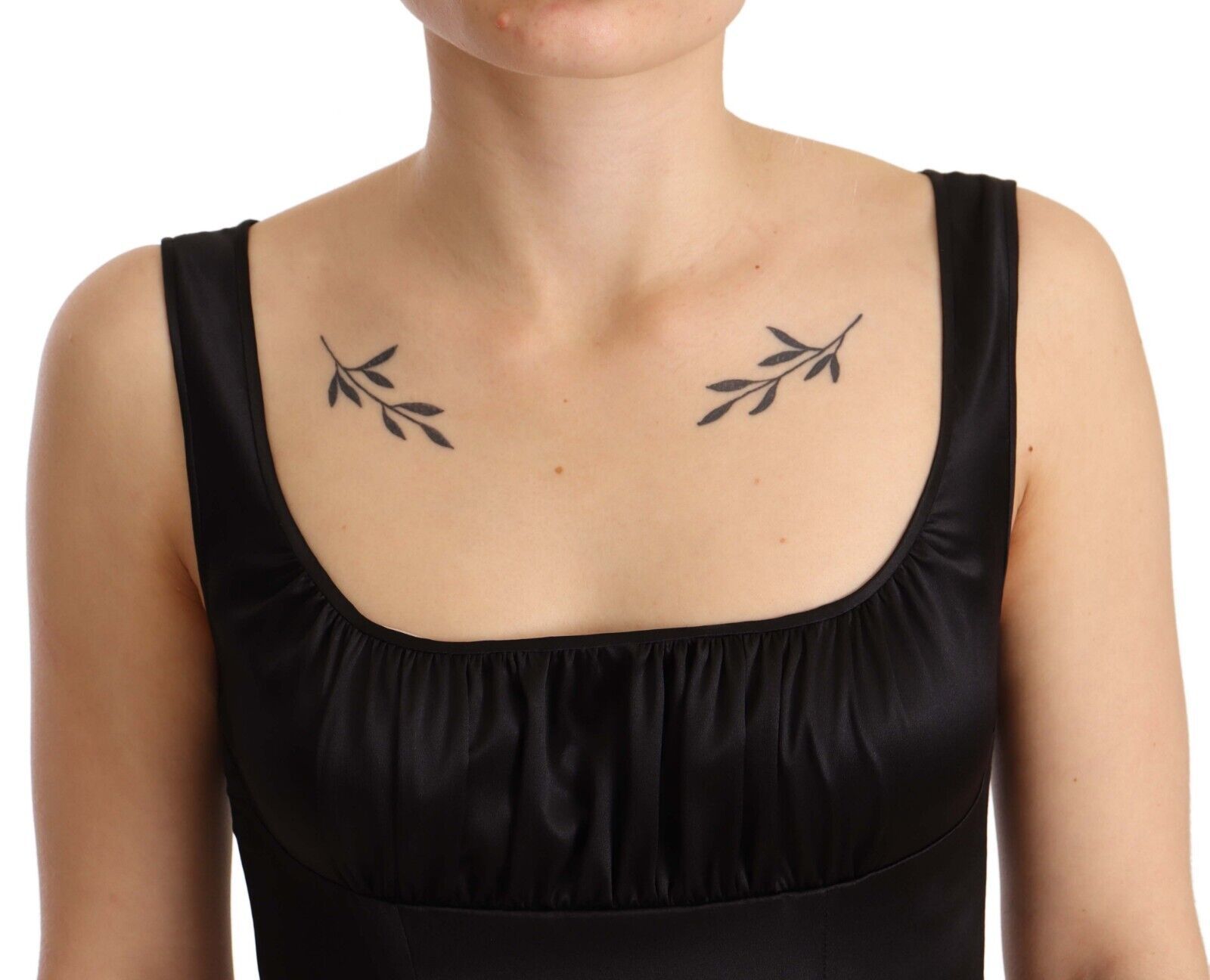 A black silk stretch sheath mermaid midi dress with lace detailing