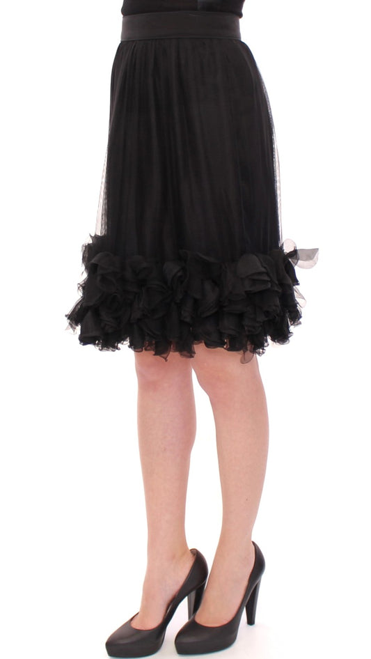 Black ruffled dress with black heels