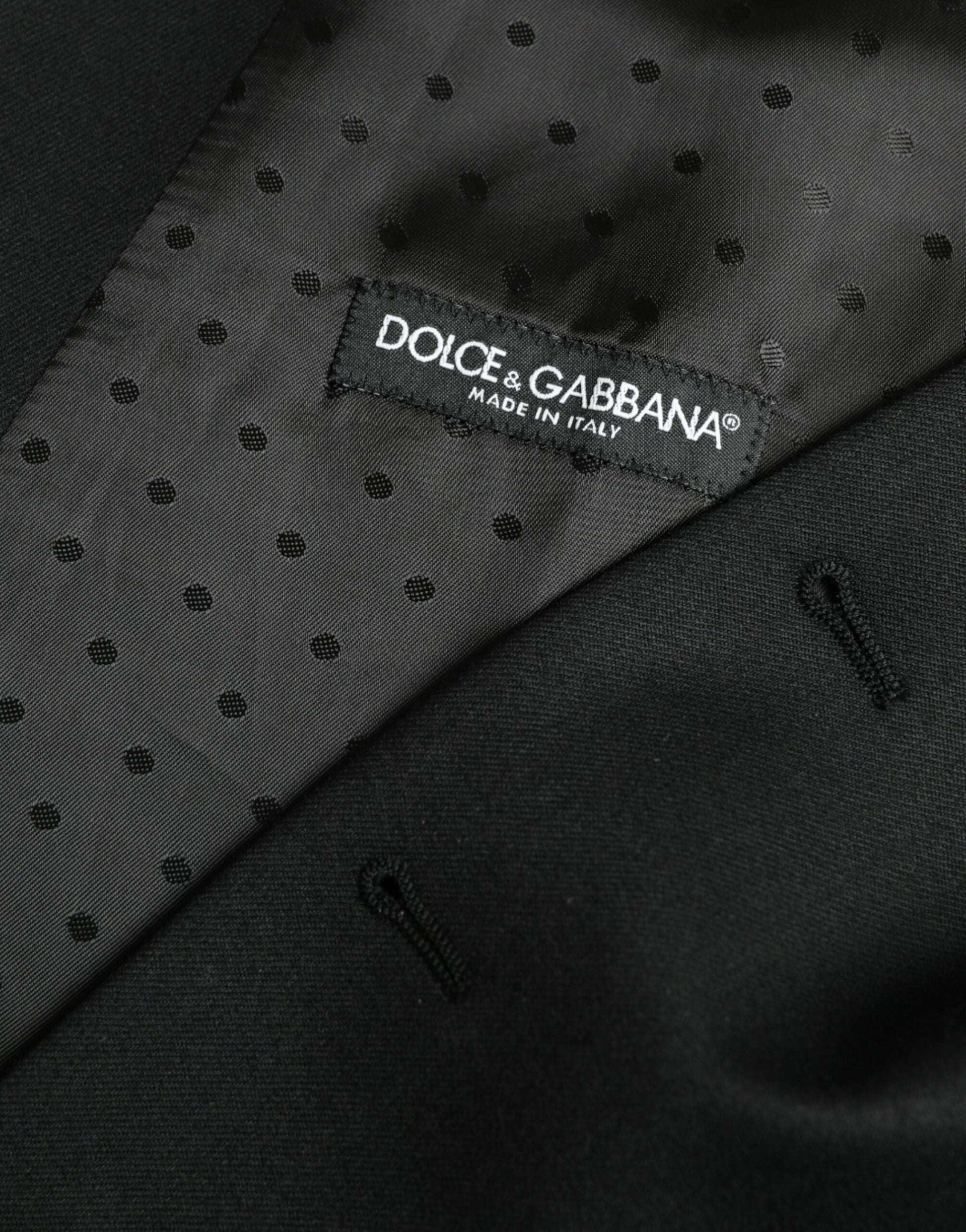 A black silk waistcoat with a polka dot pattern