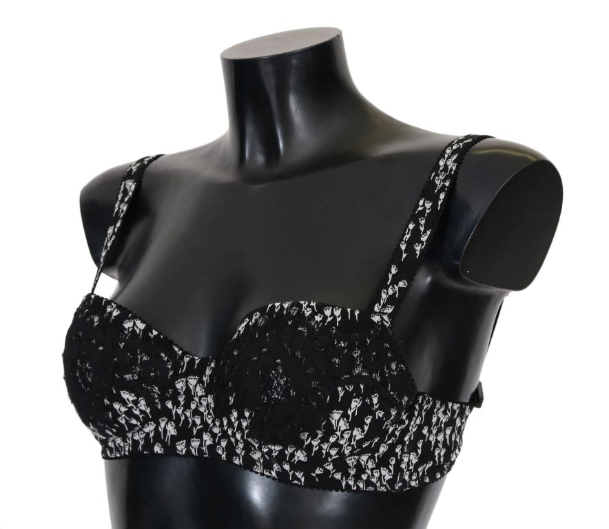 Black mannequin wearing black lace bra