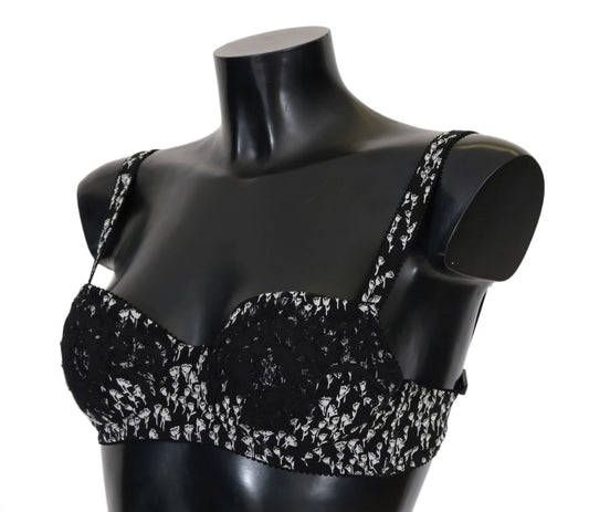Black mannequin wearing black lace bra