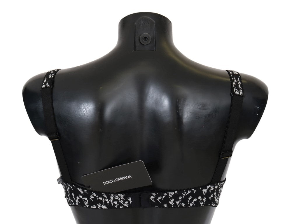 Black mannequin torso wearing a black and white bra