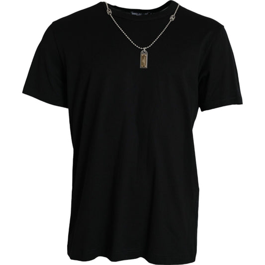 Black t-shirt with a silver chain necklace featuring a pendant