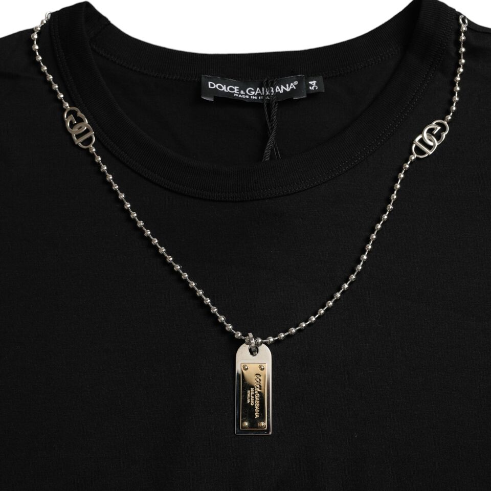 Silver chain necklace on black shirt