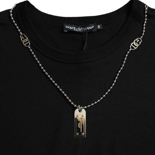 Silver chain necklace on black shirt