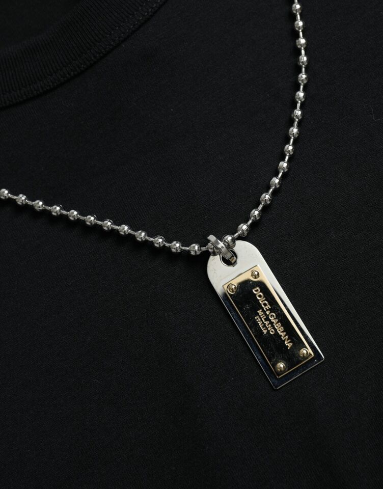 Silver necklace with black tag