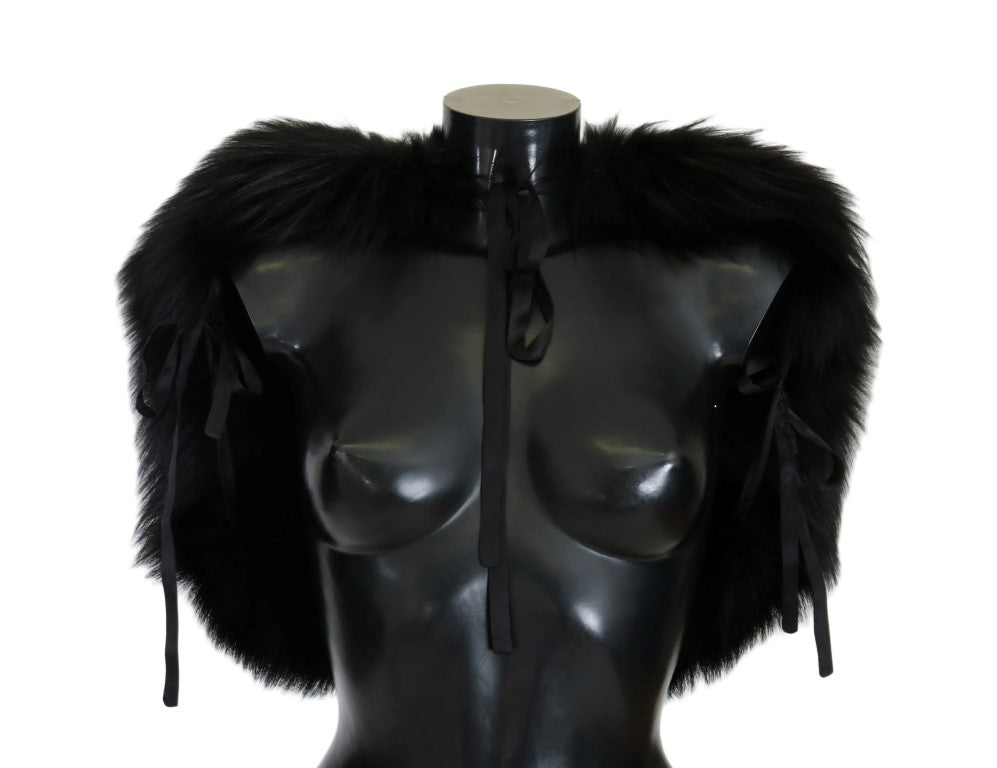 Black mannequin torso wearing fur trimmed garment