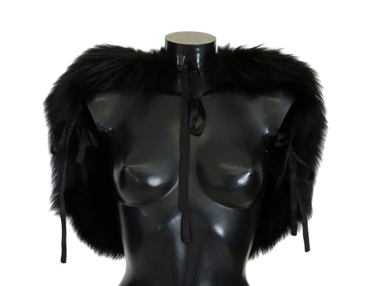 Black mannequin torso wearing fur trimmed garment