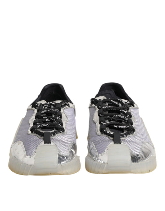 Pair of black and silver men's sneakers with laces, branded logo on side