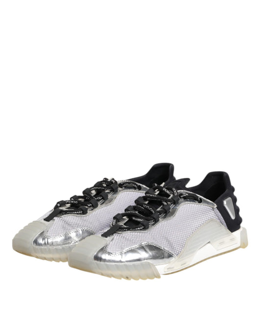 A pair of black and silver men's sneakers with a low top, featuring a textured design on the side