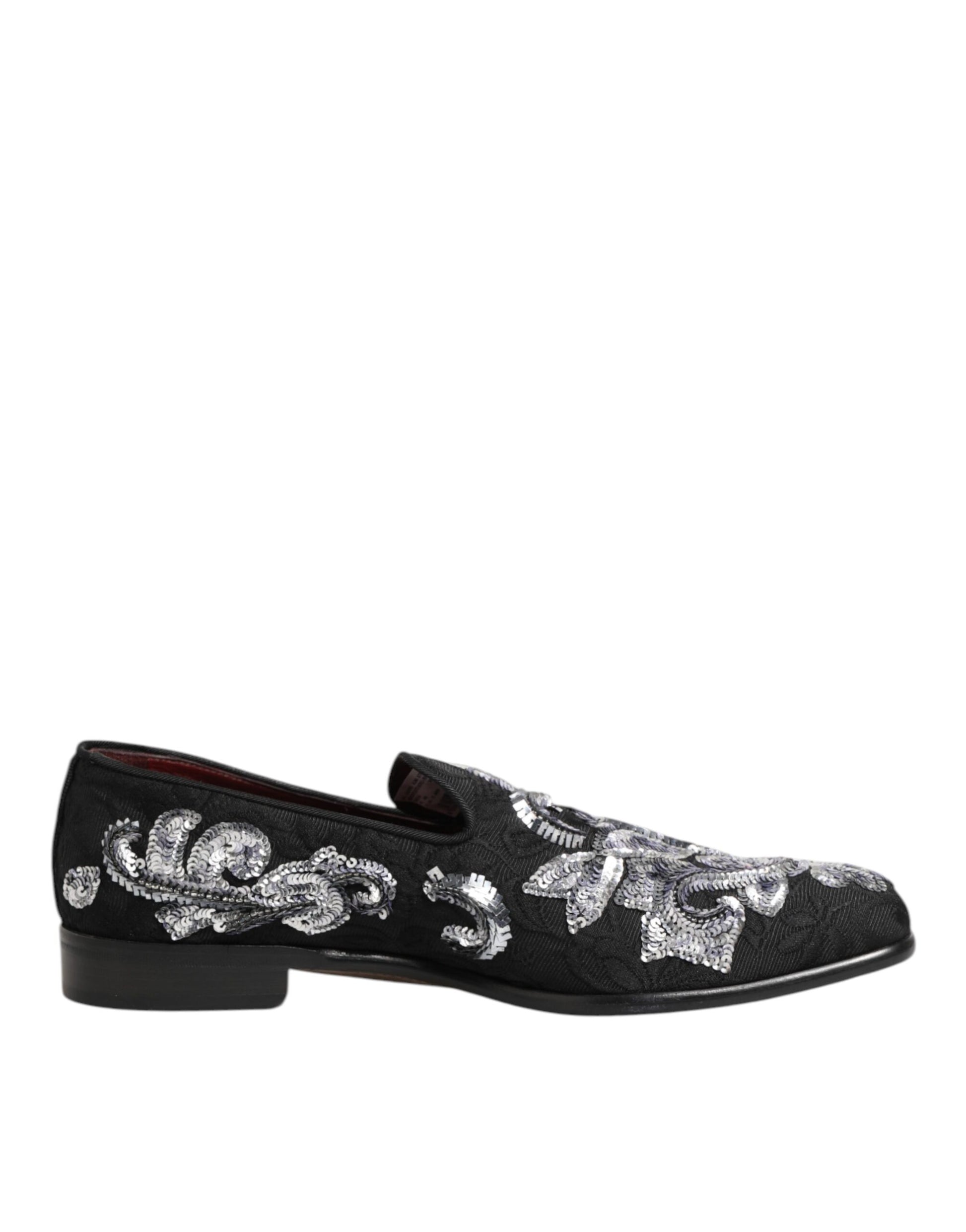 A pair of black sequined loafers with silver embroidery, designed for men's dress shoes