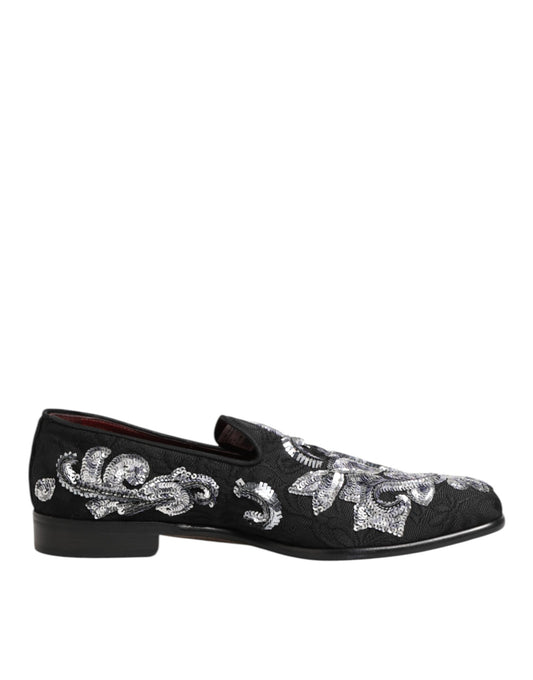 A pair of black sequined loafers with silver embroidery, designed for men's dress shoes