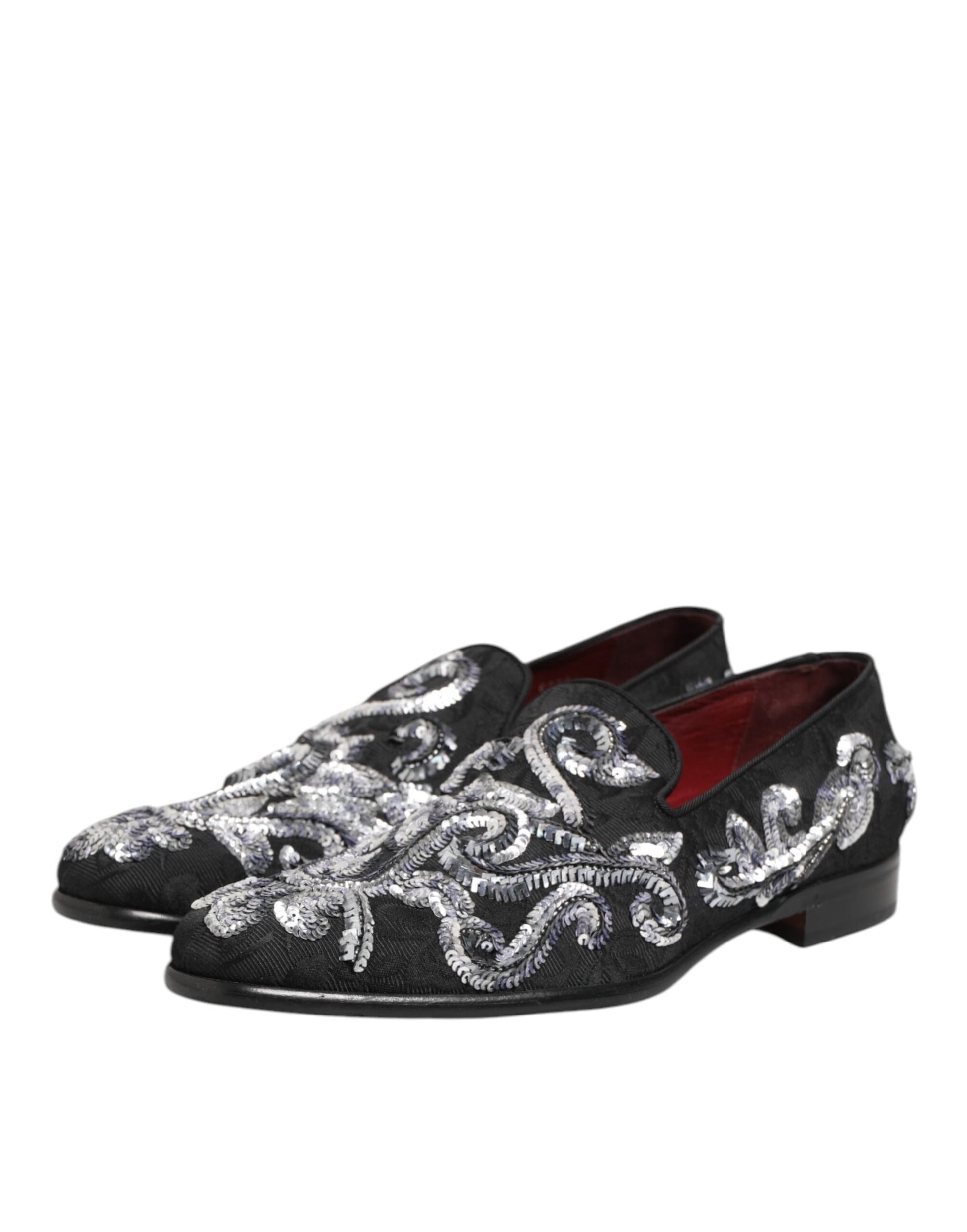 A pair of black sequined loafers with silver embroidery, designed by Dolce & Gabbana