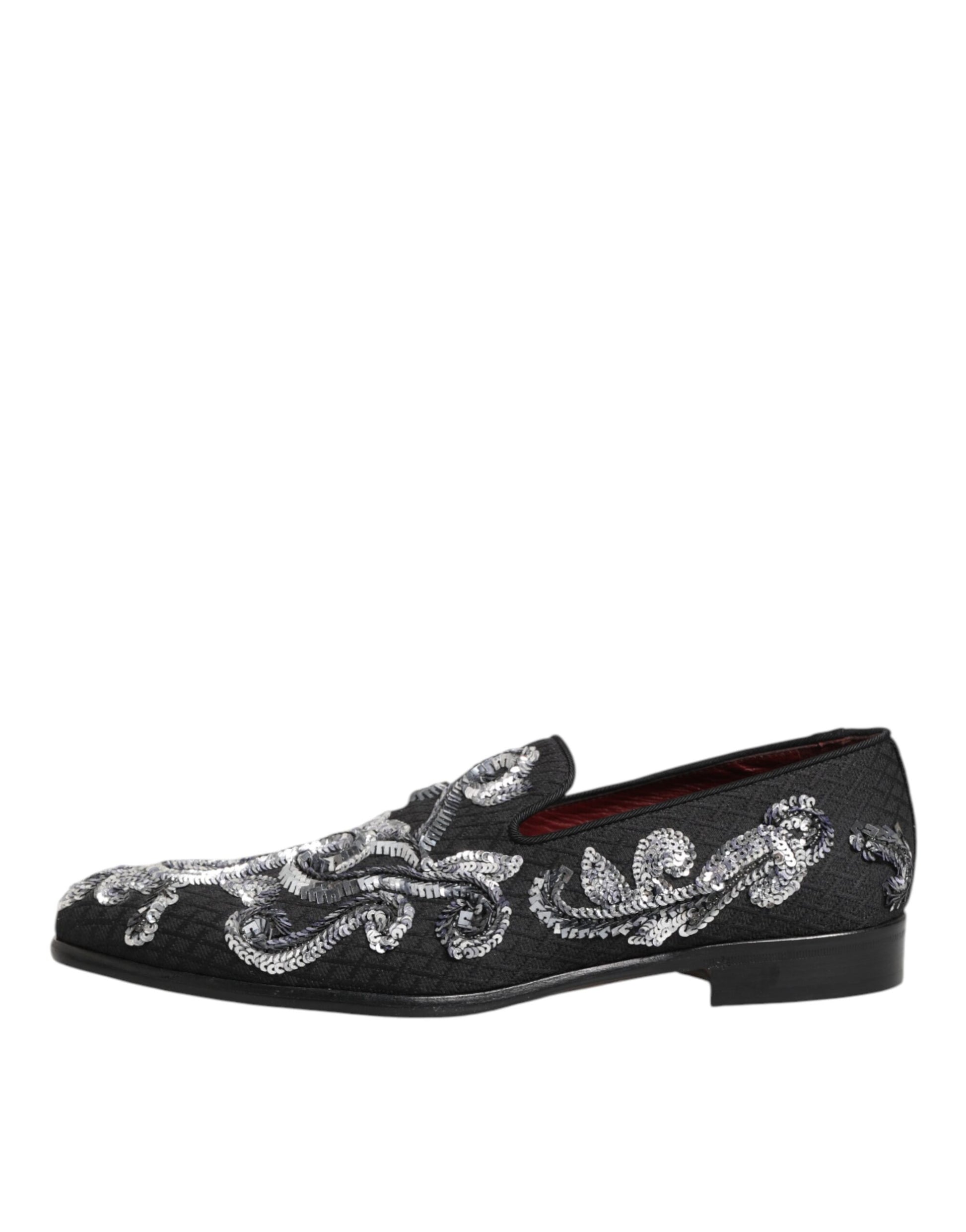 A pair of black sequined loafers with silver embroidery, designed for men's formal wear