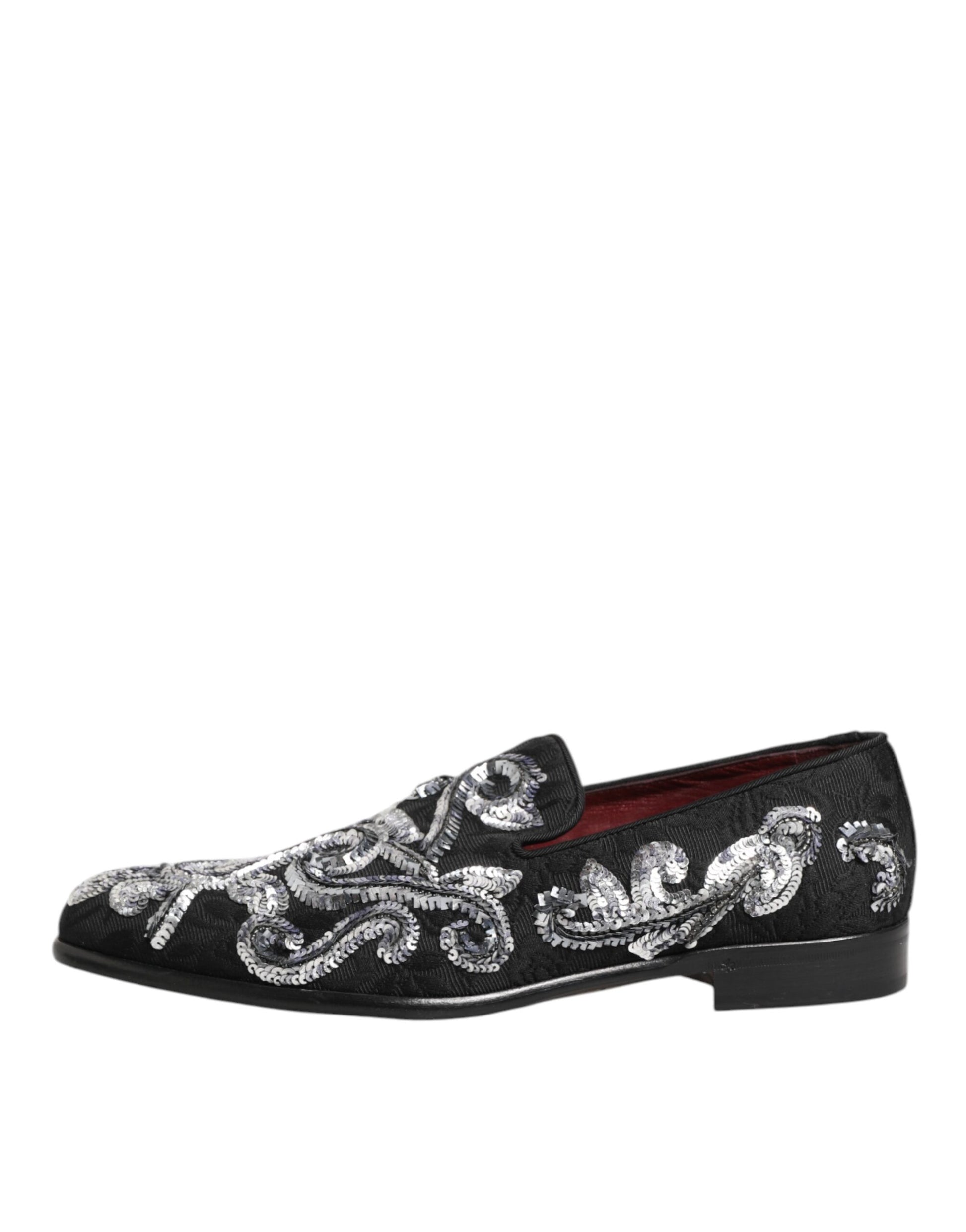 A pair of black sequined loafers with silver embroidery, designed for men's dress shoes