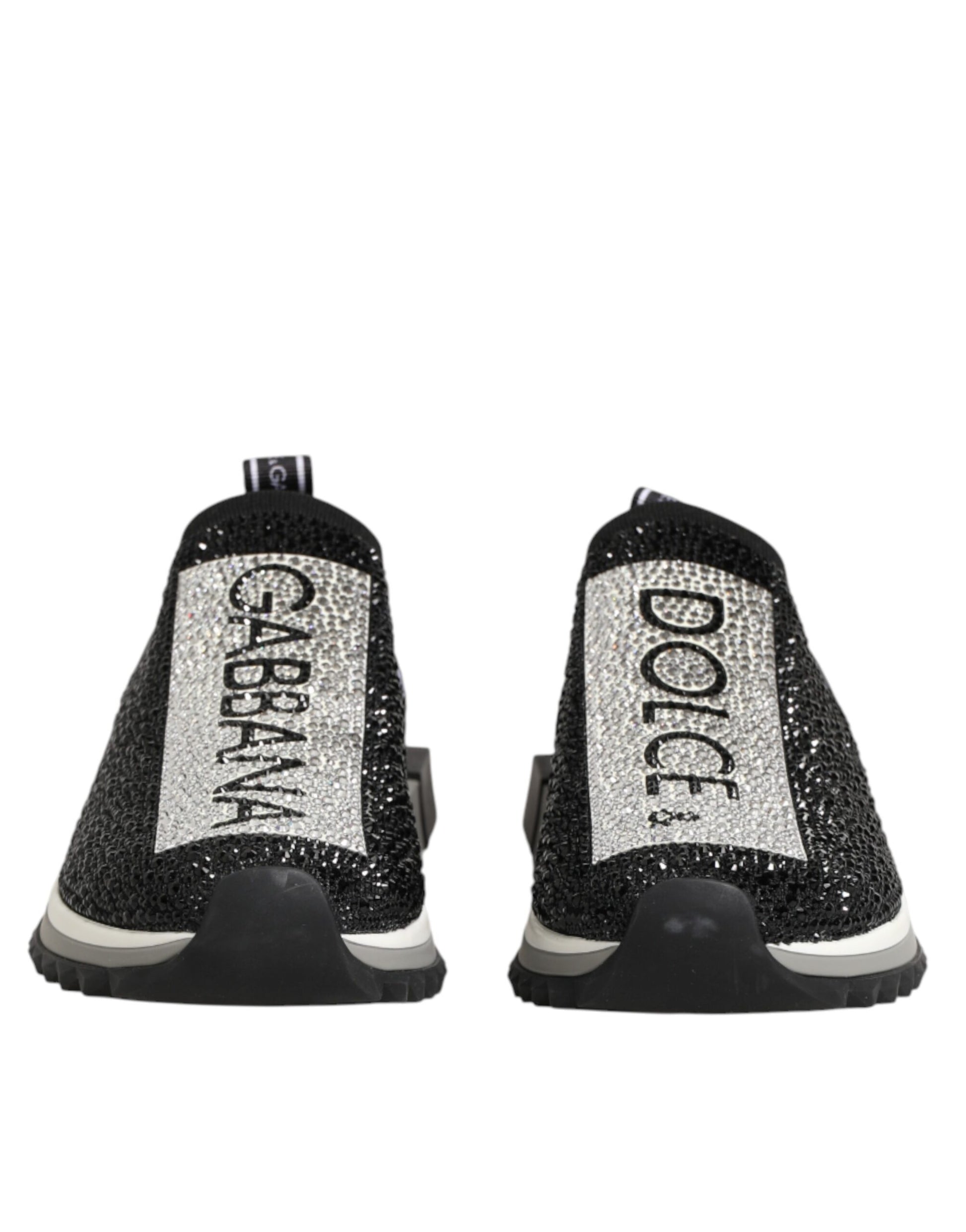 Pair of glittery sneakers with brand names on sides