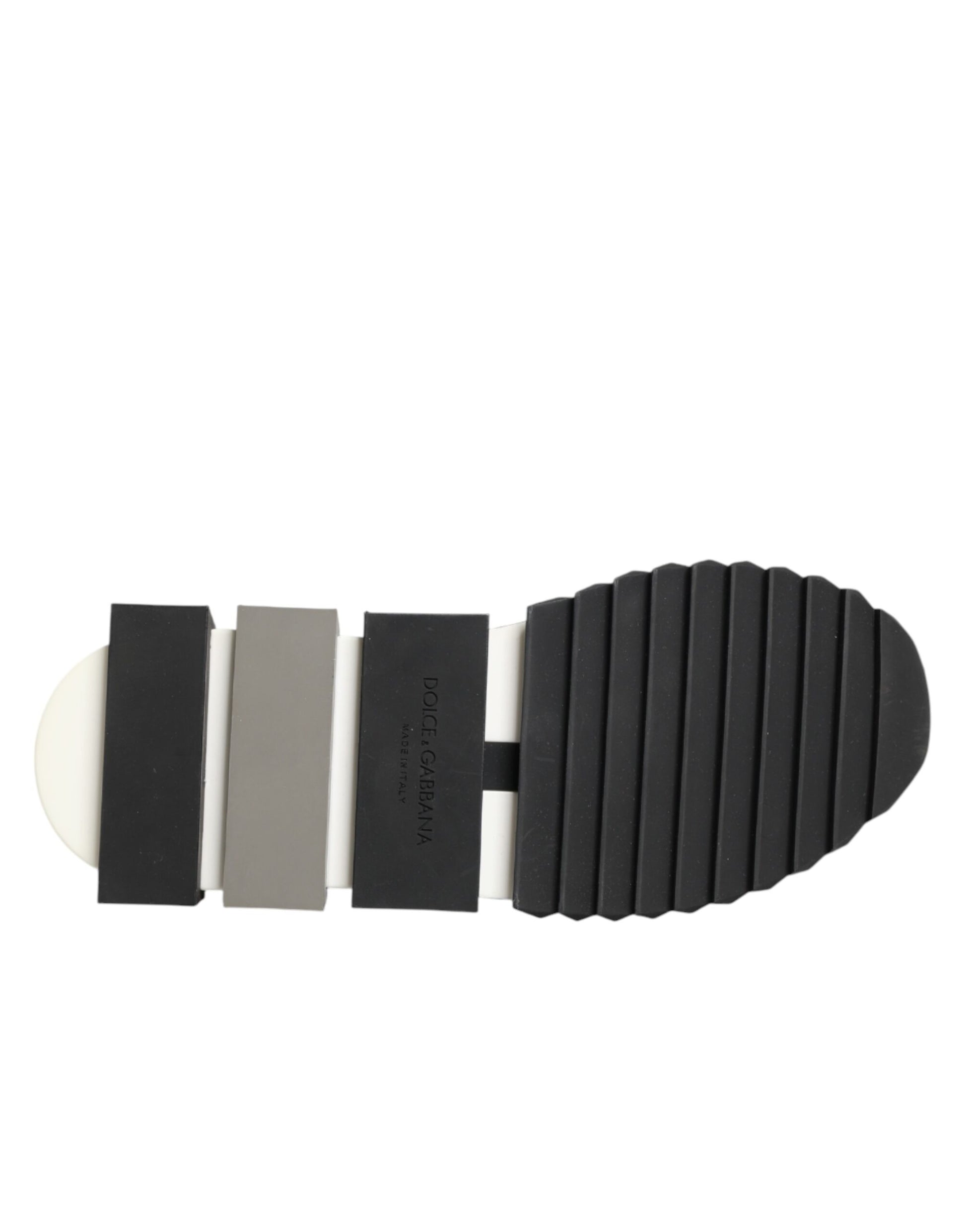 Footwear with a black sole and multiple straps