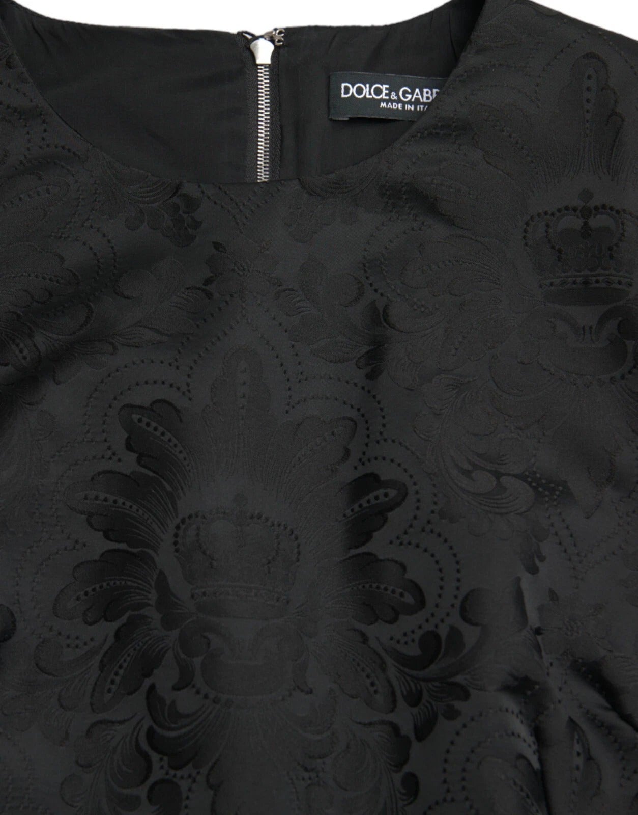 Black sleeveless bodycon dress with lace detailing
