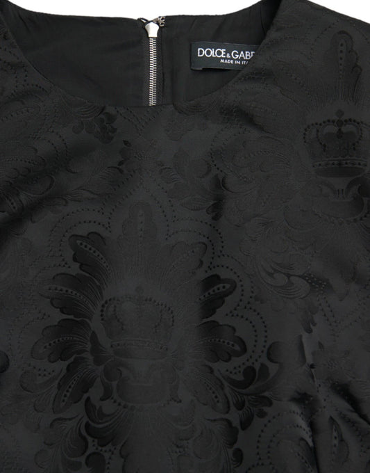 Black sleeveless bodycon dress with lace detailing