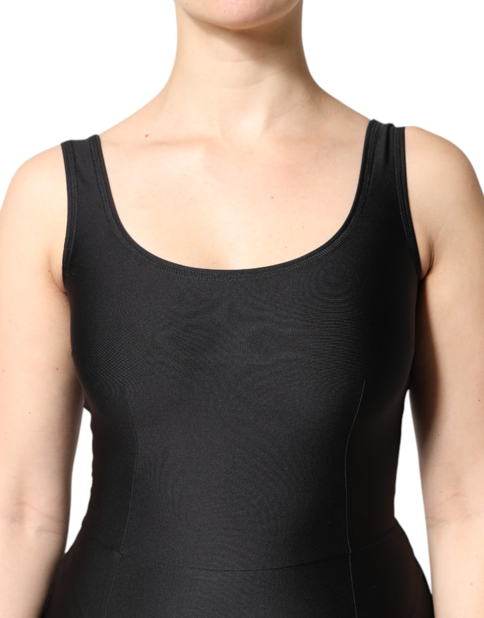 A black sleeveless bodycon jumpsuit dress on a mannequin