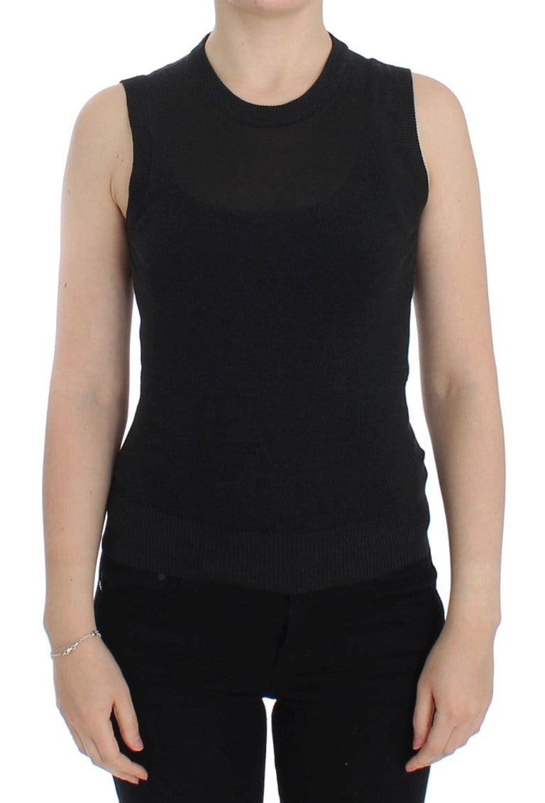 Black tank top on woman
