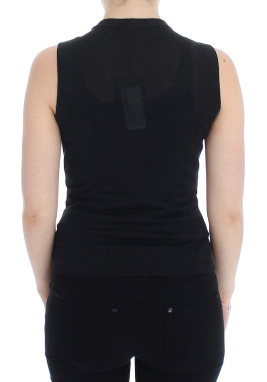 Black sleeveless top with a high neckline