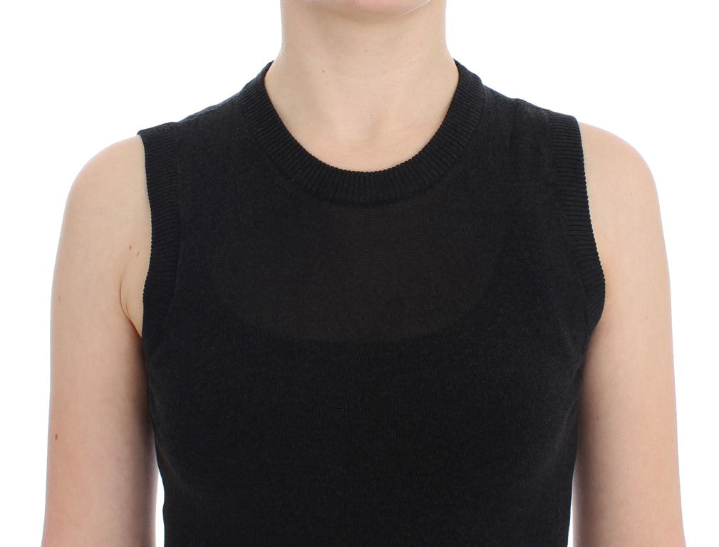 Black sleeveless top with sheer panel on front