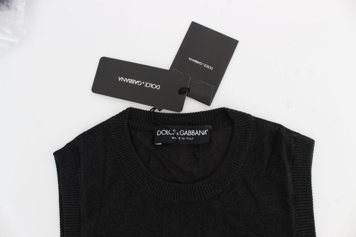 Black knit sweater on hanger