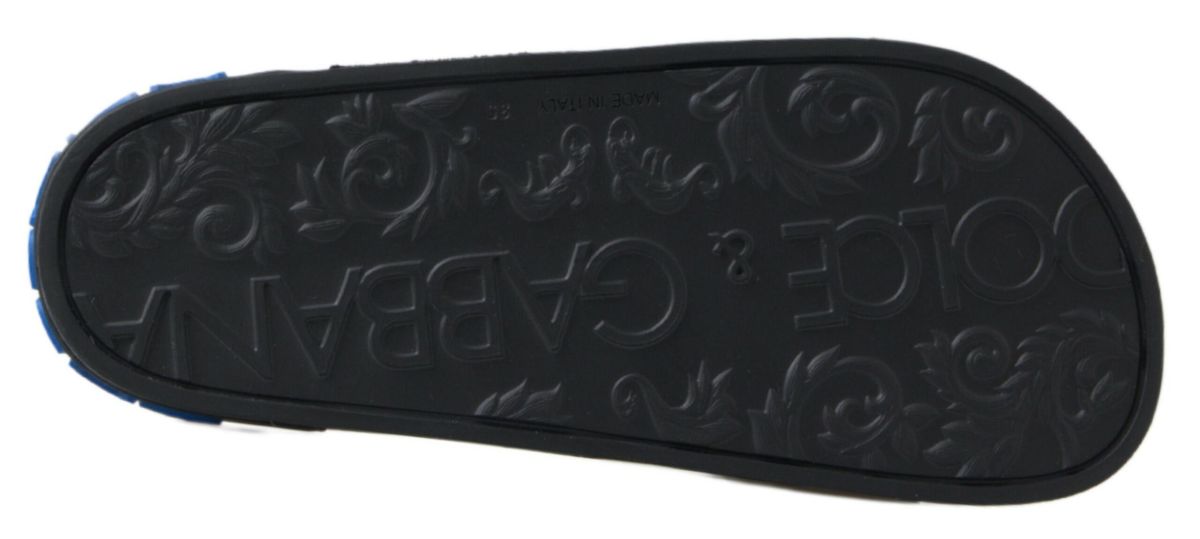 Black shoe with embossed design on sole