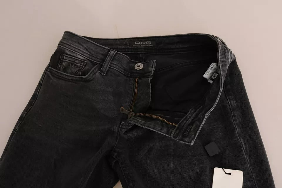 Pair of black jeans with torn knees