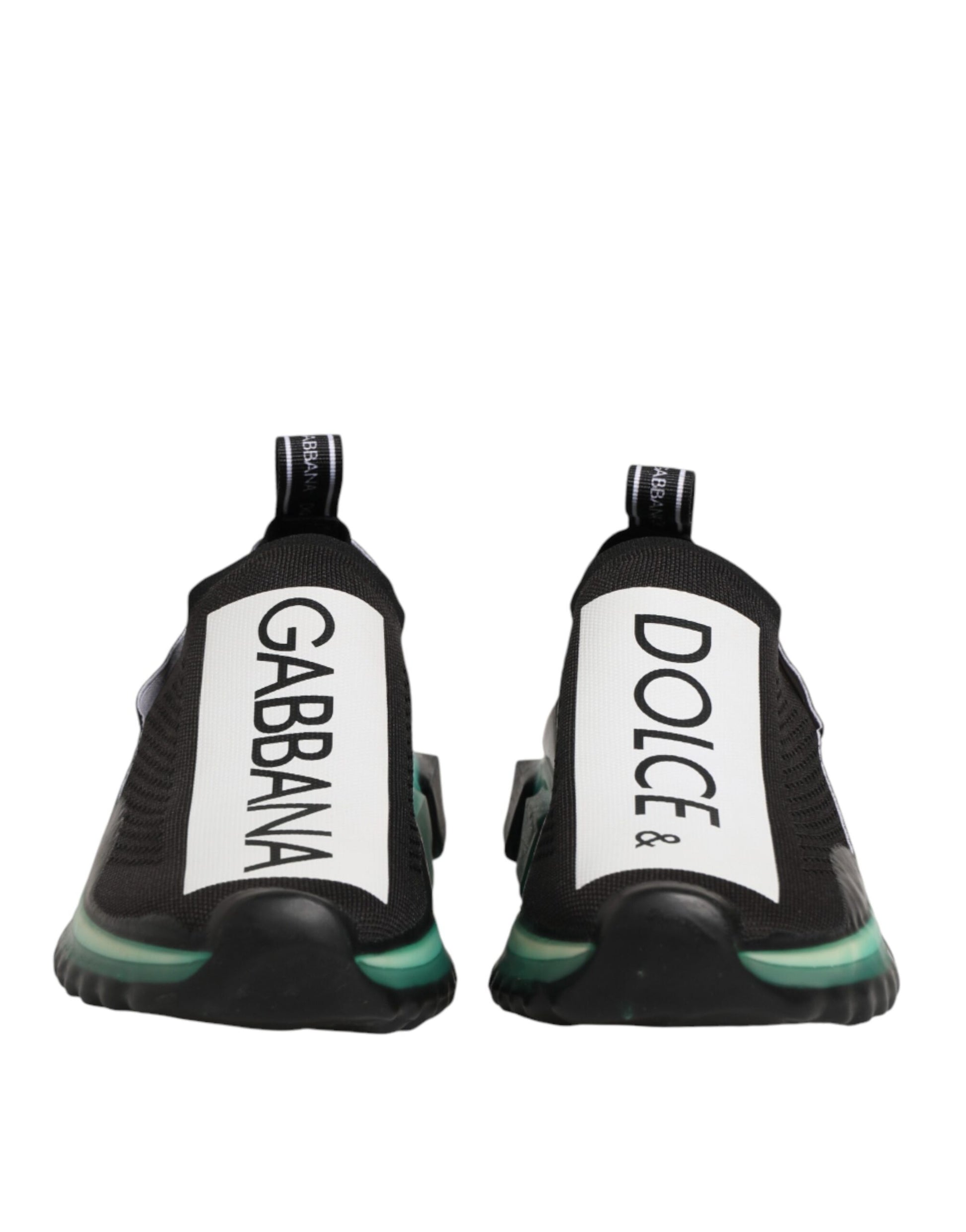 Pair of black sneakers with white text on side