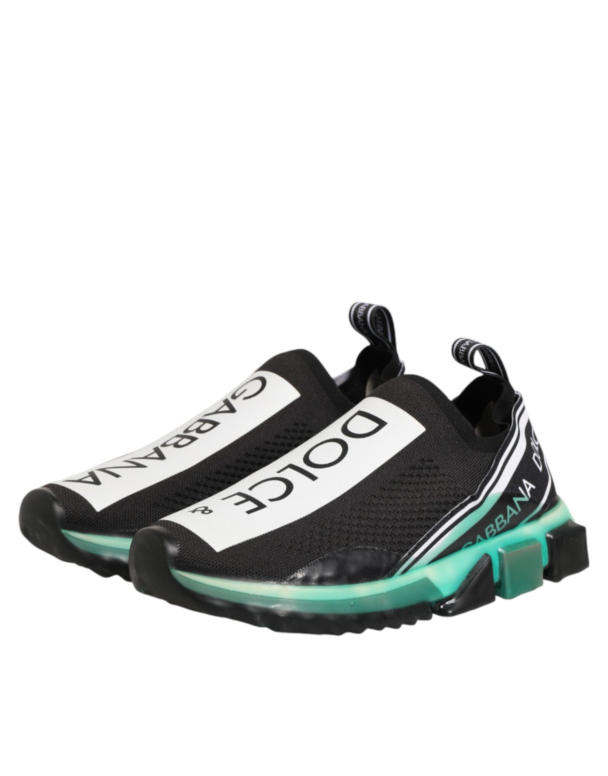Black and white sneakers with green accents