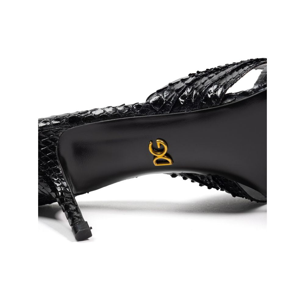 Black high heel shoe with gold logo on side