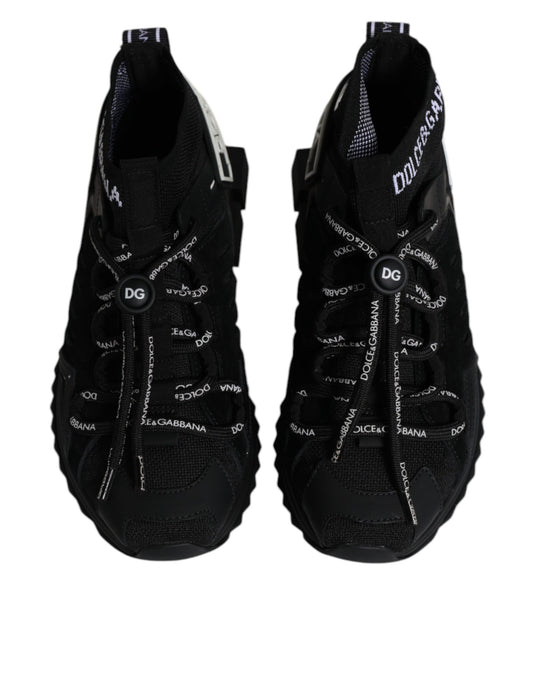 Pair of black hiking shoes with white laces and logo on side