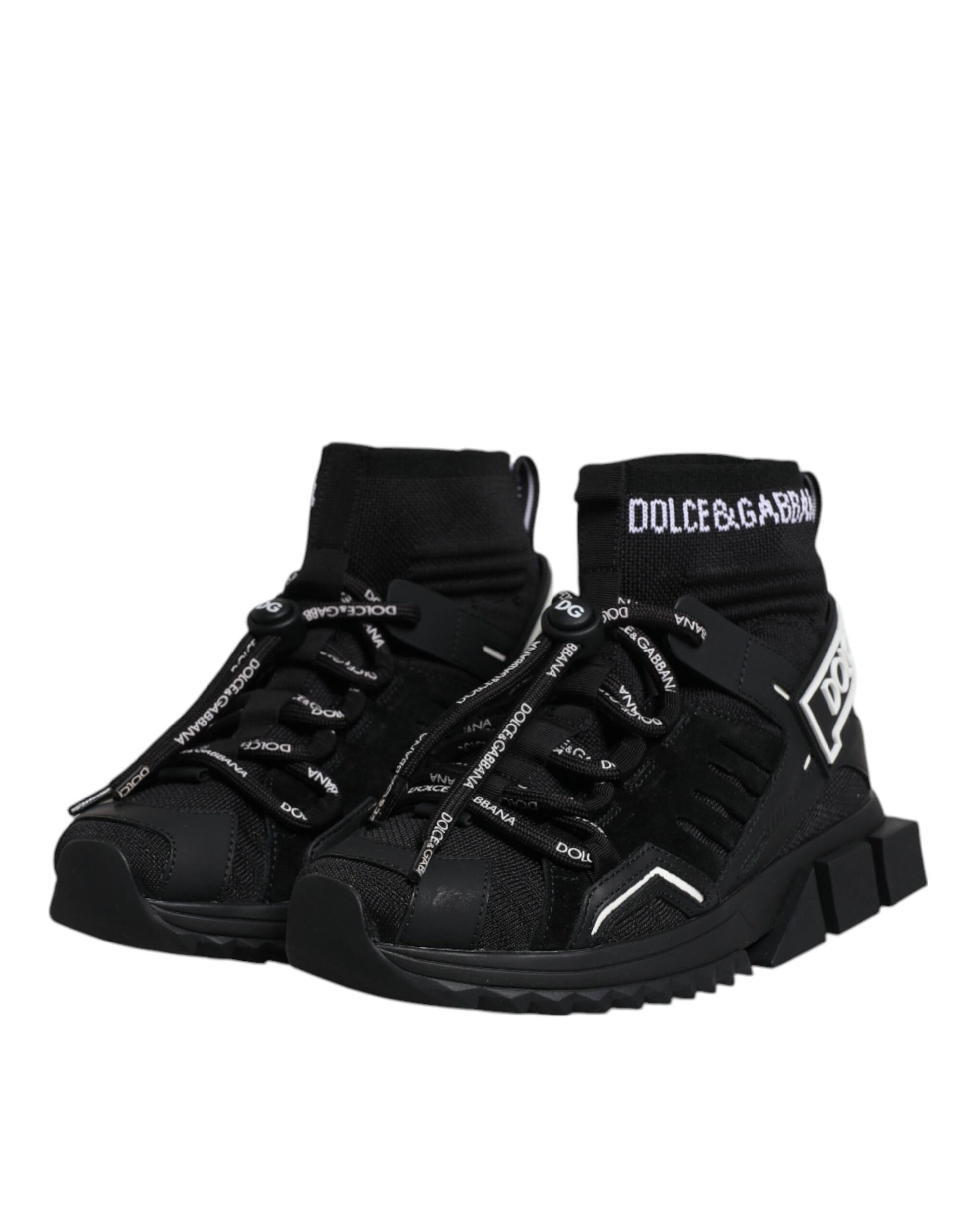 Pair of black and white sneakers with laces and a logo on the side