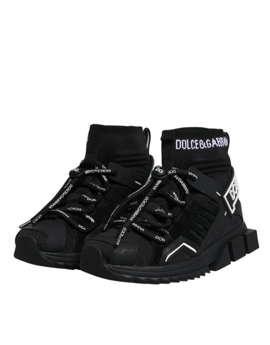 Pair of black and white sneakers with laces and a logo on the side