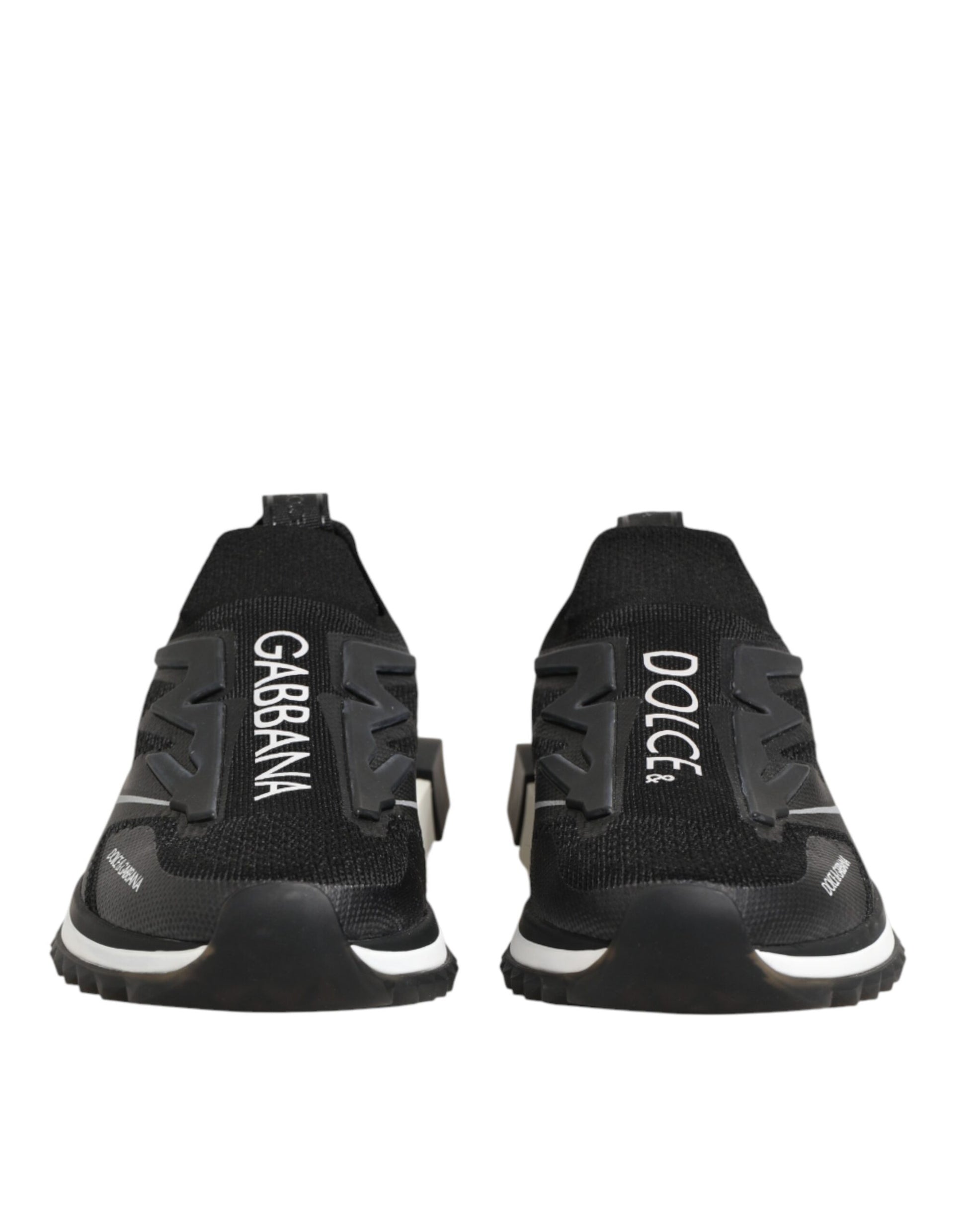 Pair of black sneakers with white soles