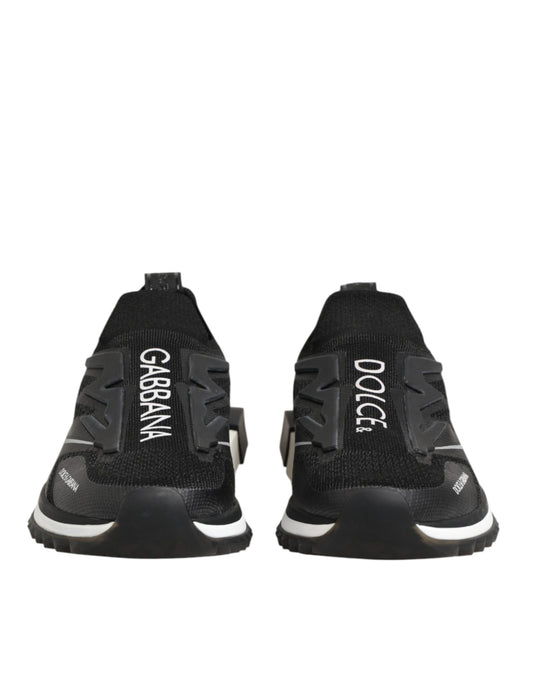 Pair of black sneakers with white soles